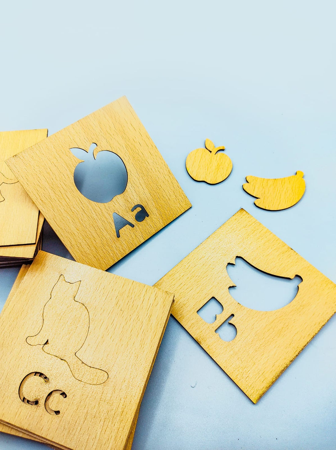 Wooden A to Z Alphabets Learning box with pictures Stencils with coloring pencils.
