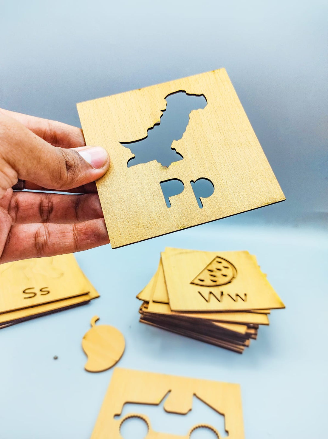 Wooden A to Z Alphabets Learning box with pictures Stencils with coloring pencils.