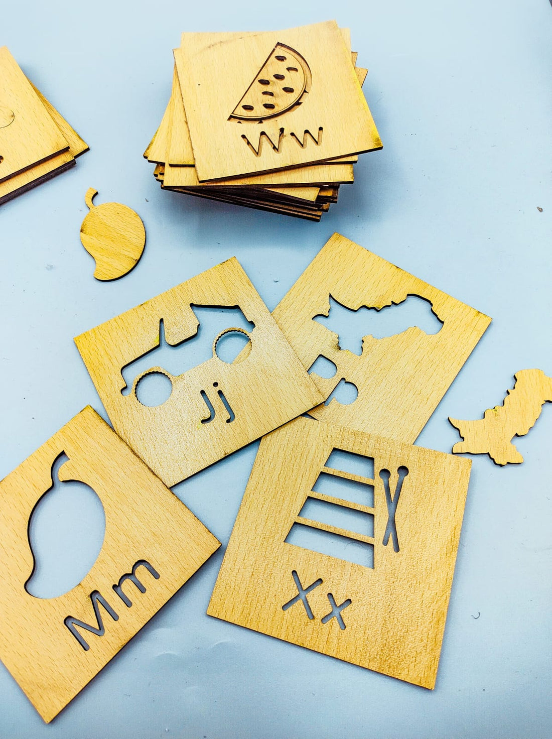 Wooden A to Z Alphabets Learning box with pictures Stencils with coloring pencils.